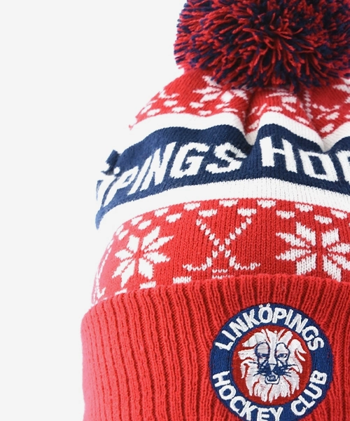 Stickad sn&ouml;flingetr&ouml;ja i bl&aring;tt, vitt och r&ouml;tt med Link&ouml;ping Hockey Clubs logotyp.